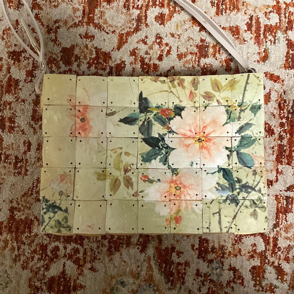 Handmade wooden bag with floral design